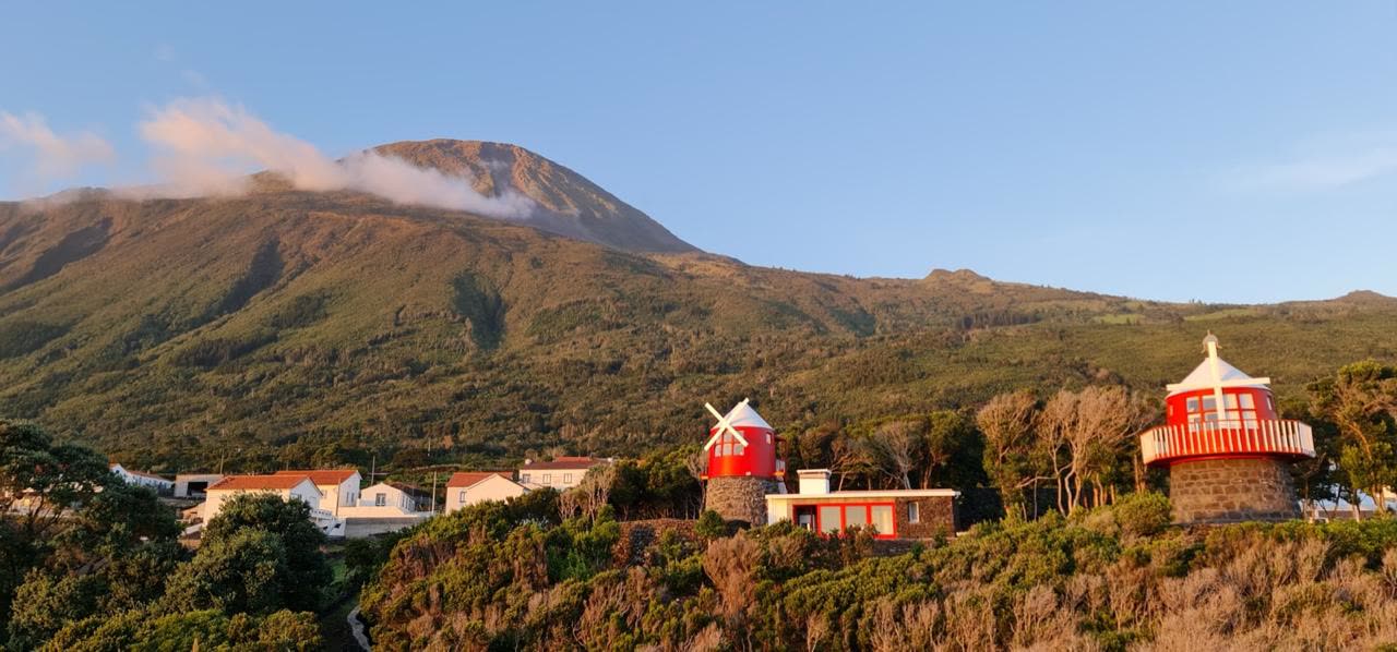The Manuel Domingos and Choca mills below the Pico volcano at golden hour